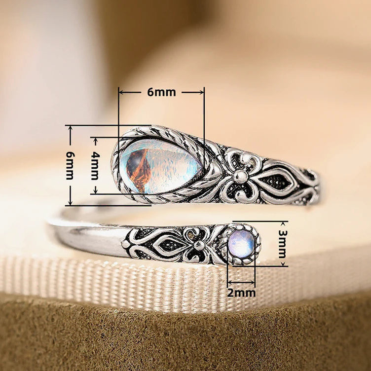 Adjustable aged-look ring with two moonstones