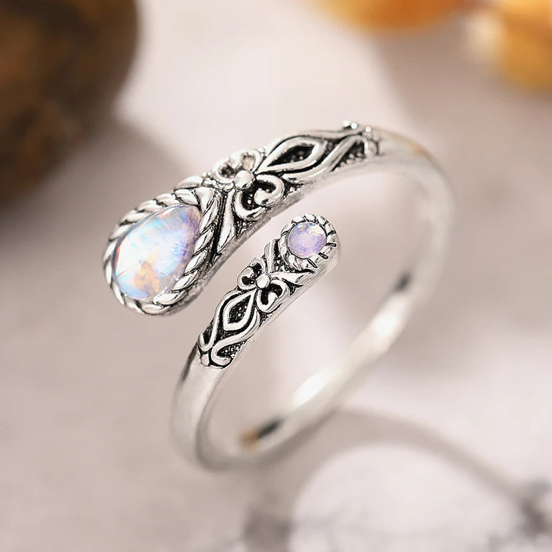 Adjustable aged-look ring with two moonstones