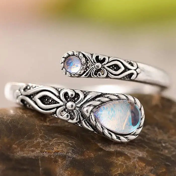 Adjustable aged-look ring with two moonstones