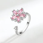 Bague ajustable avec fleur rotative anti-stress en cristaux roses
