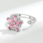 Bague ajustable avec fleur rotative anti-stress en cristaux roses