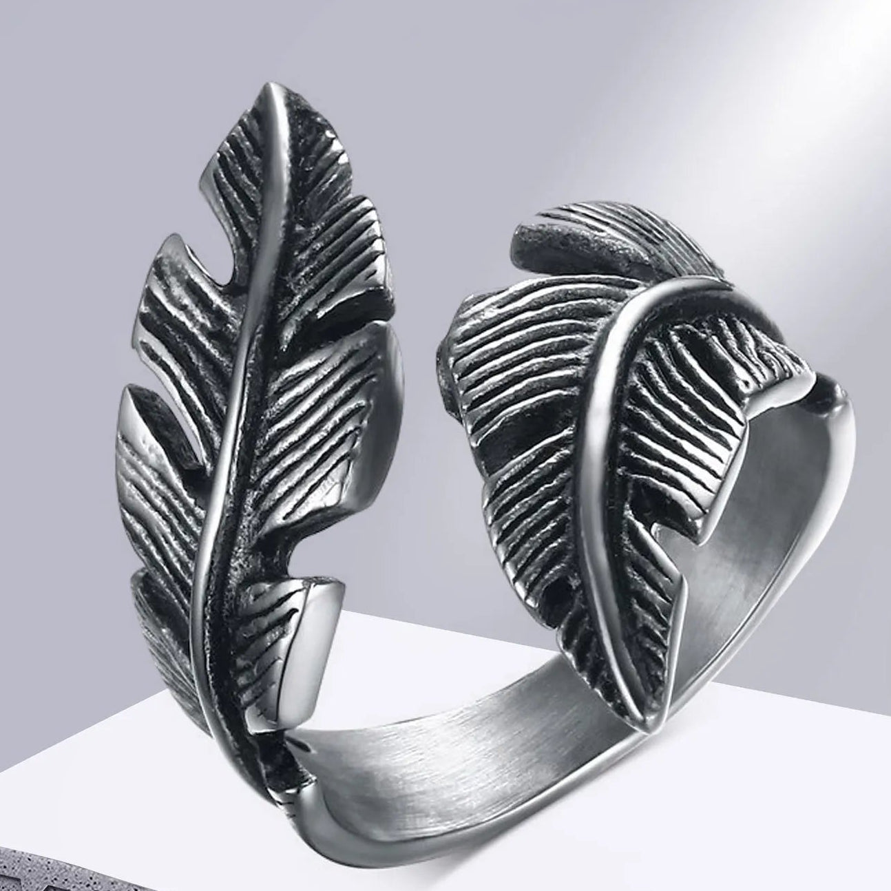 Bague ajustable plume argentée
