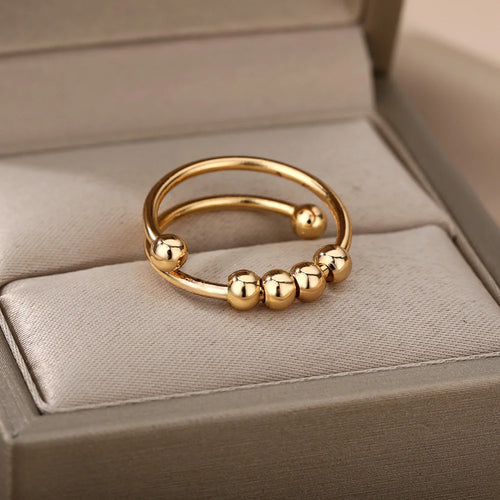 Bague Anneau Anti-Stress Perles Tournantes or