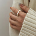 Ring mit weißen Perlen