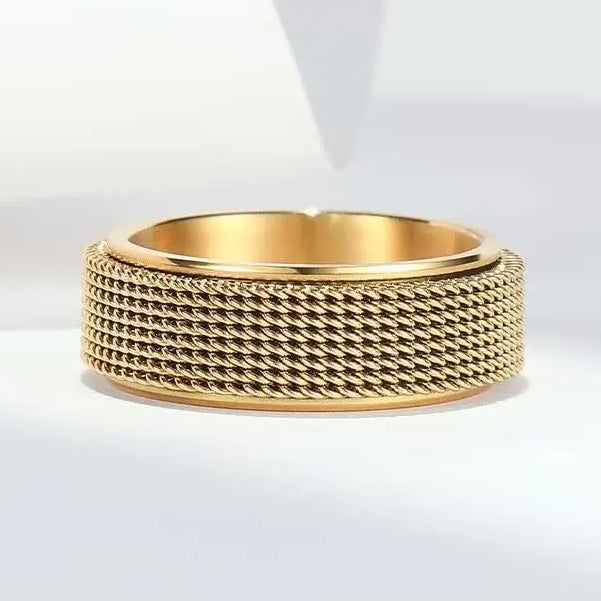 Bague anti-stress rotative à motif torsadé or
