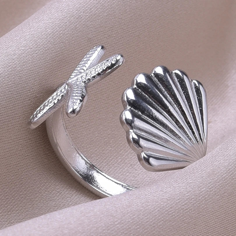 Ring mit Muscheln, Seestern und Jakobsmuschel aus Silber