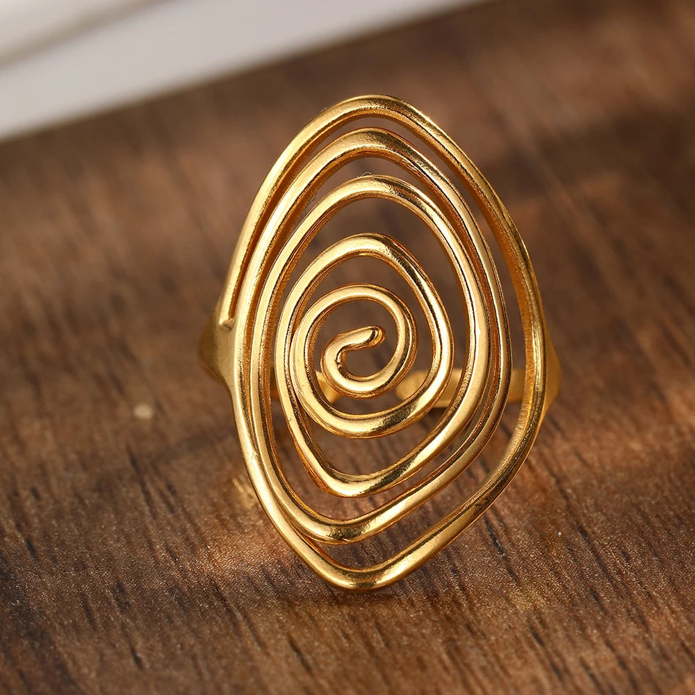 Bague large en forme de spirale texturée or
