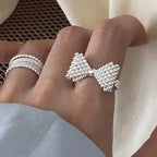 Bague noeud papillon et perles