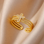 Damenring mit dreifachem christlichem Kreuz aus Gold