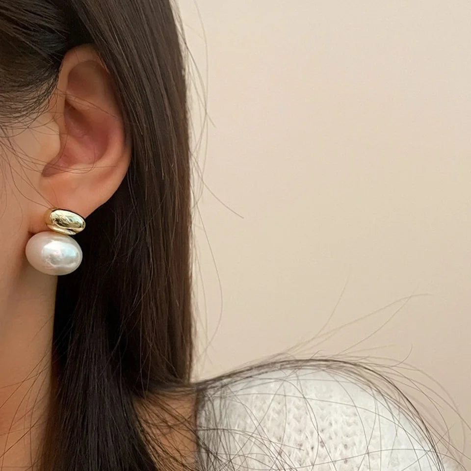Orecchini con doppia perla argento