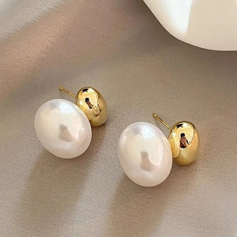 Orecchini con doppia perla oro