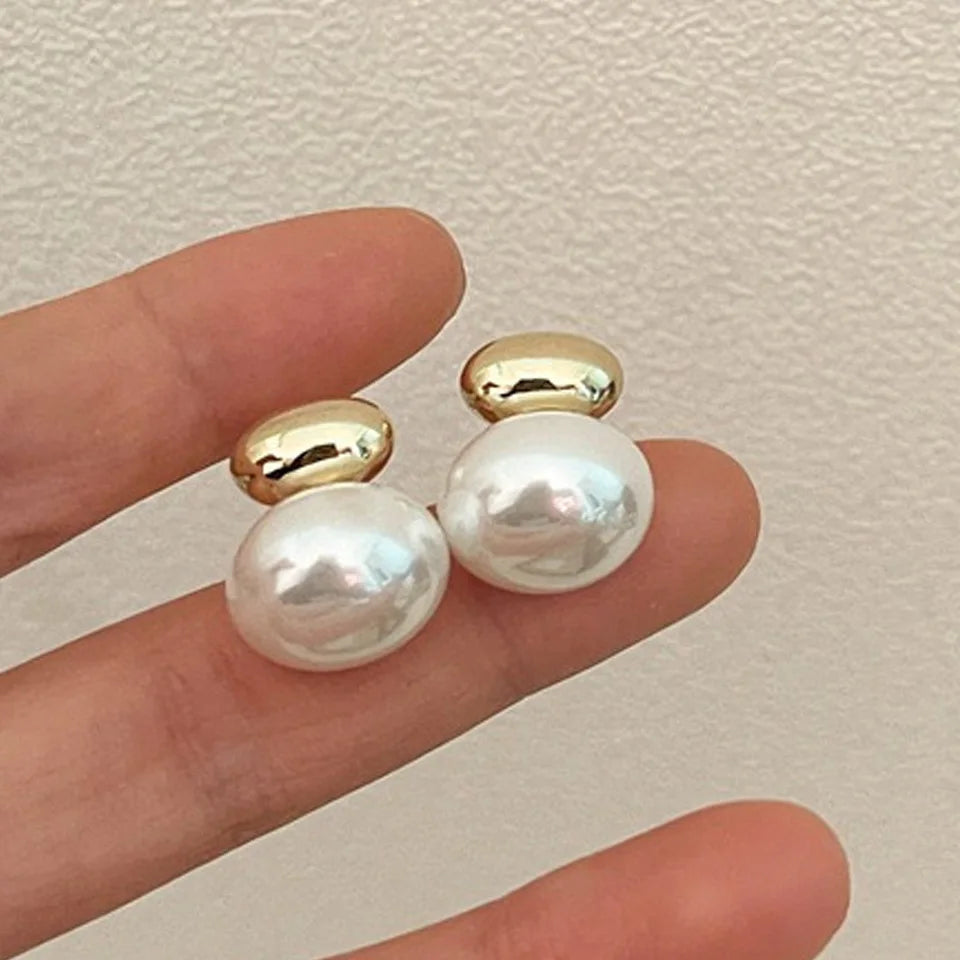 Orecchini con doppia perla