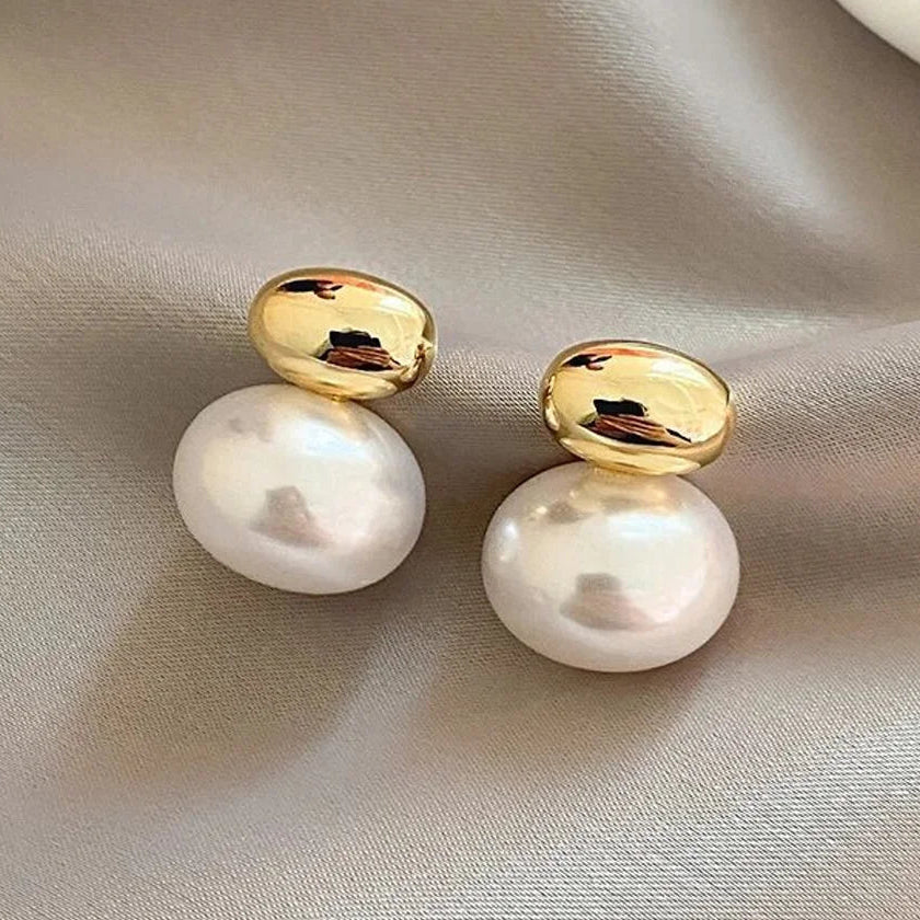 Orecchini con doppia perla oro