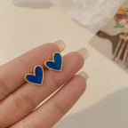 Blue mother-of-pearl effect heart earrings