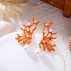 Orange coral and pearl earrings