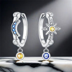 Boucles d'oreilles créoles asymétriques lune et soleil