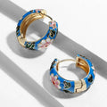 Boucles d'oreilles créoles fleurs de roses émaillées bleu
