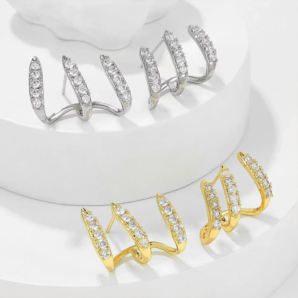 Elegante øreringe med tre-kløft krystaller 
