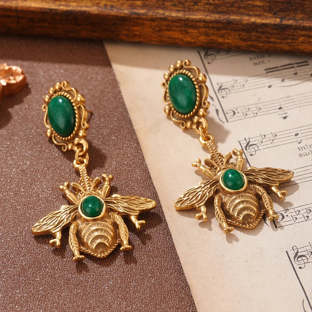 Green bee drop earrings
