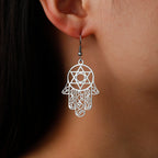 Dangling earrings with the Jewish protection symbol Fatma's hand and Star of David silver