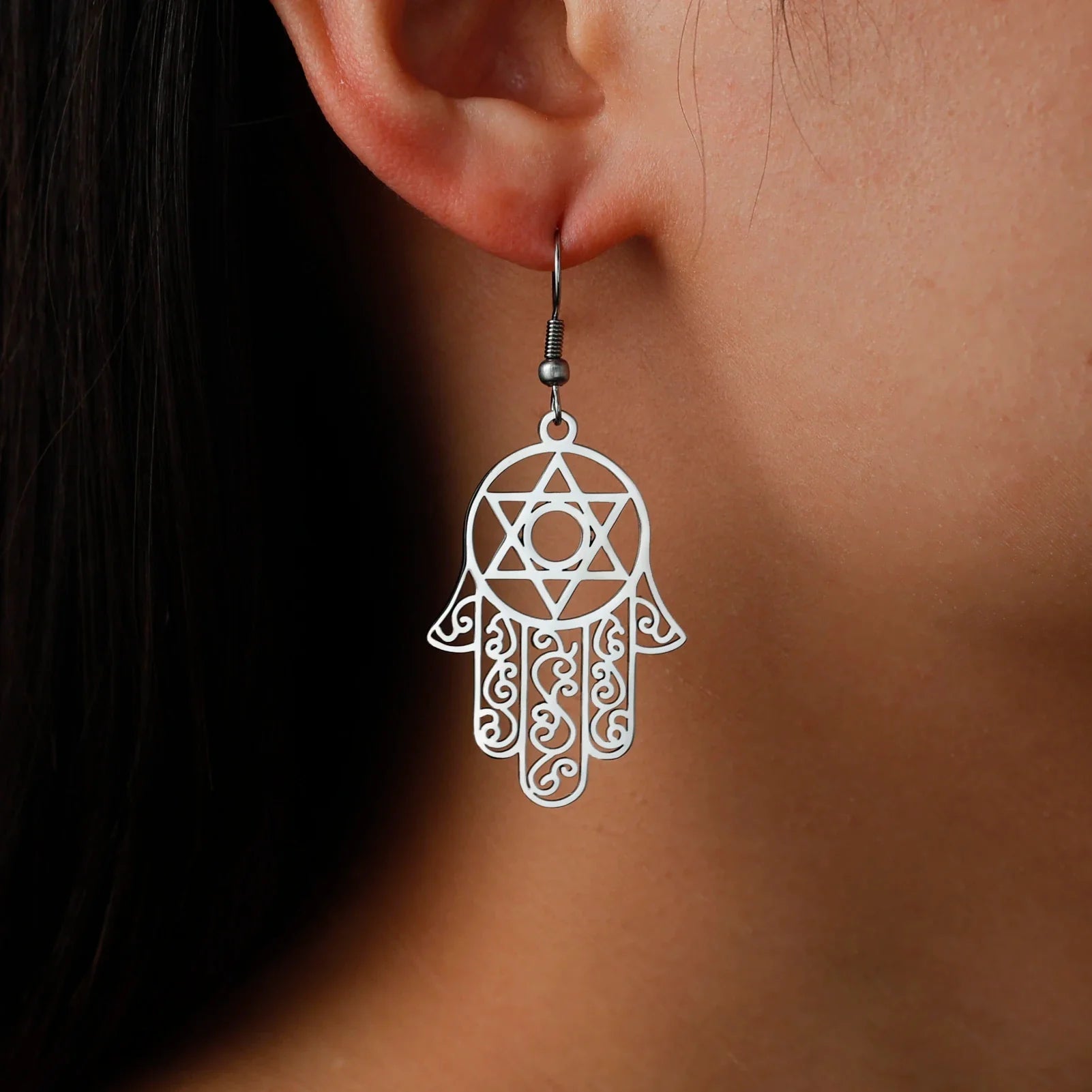 Dangling earrings with the Jewish protection symbol Fatma's hand and Star of David silver