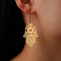 Dangling earrings with the Jewish protection symbol Fatma's hand and Star of David gold