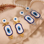 Boucles d'Oreilles Pendantes Ethniques Oeil Bleu