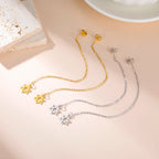 Långa hängande örhängen med <span data-glossary-id="">Davidsstjärnan</span> judiskt symbol i guld och silver