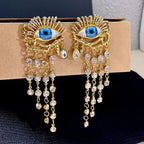 Boucles d'Oreilles Pendantes Oeil Bleu et Strass