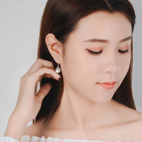 Boucles d'oreilles pendantes pierre de lune éclat céleste