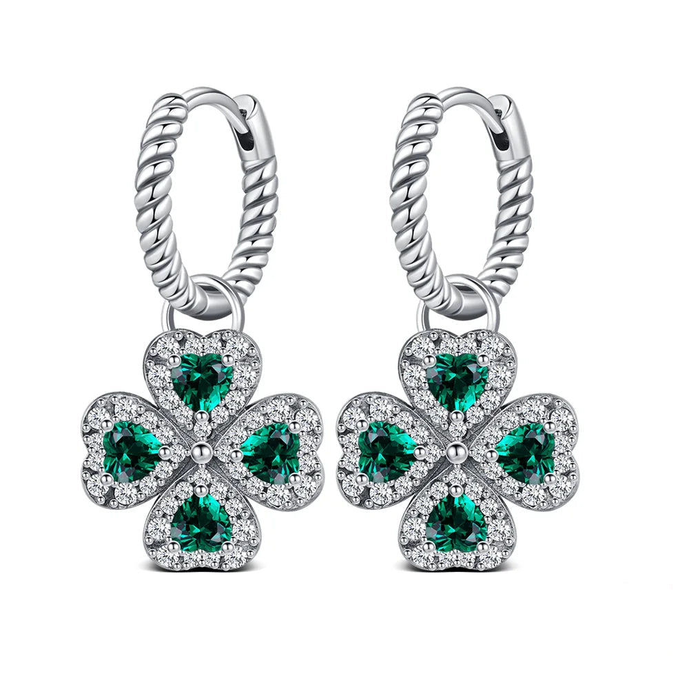 Hängande örhängen med tvinnad design och fyrklöver