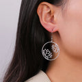 Boucles d'Oreilles Rondes Pendantes Fleur de Lotus argent