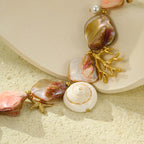Muschelarmband mit schönen Perlmuttperlen