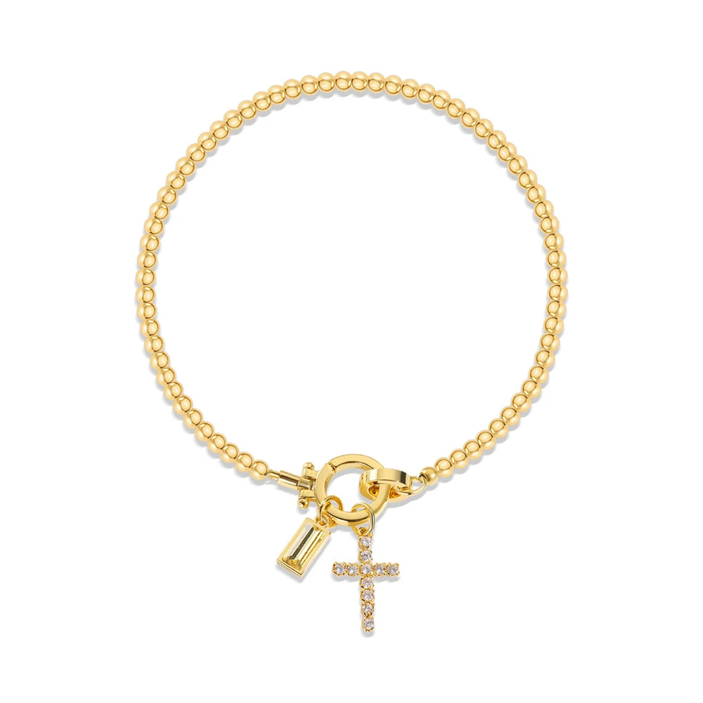 Bracelet avec croix et pierre de naissance