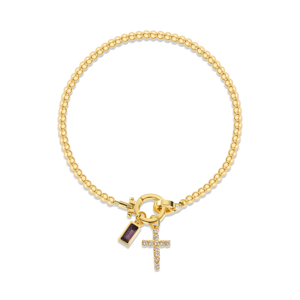 Bracelet avec croix et pierre de naissance