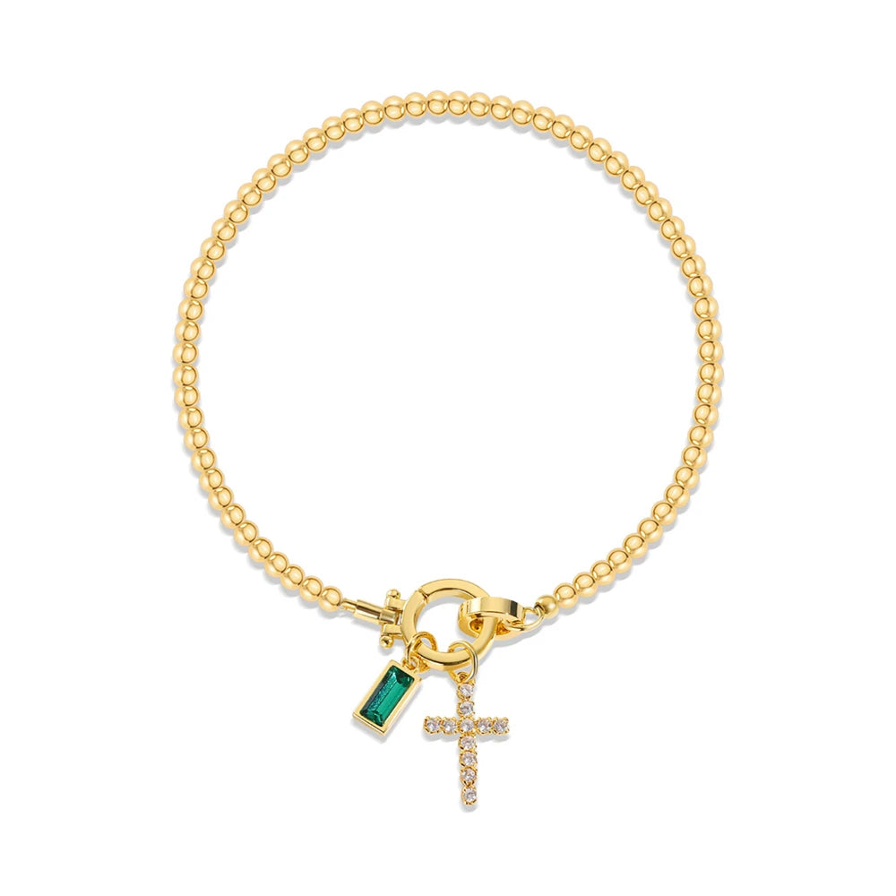 Bracelet avec croix et pierre de naissance