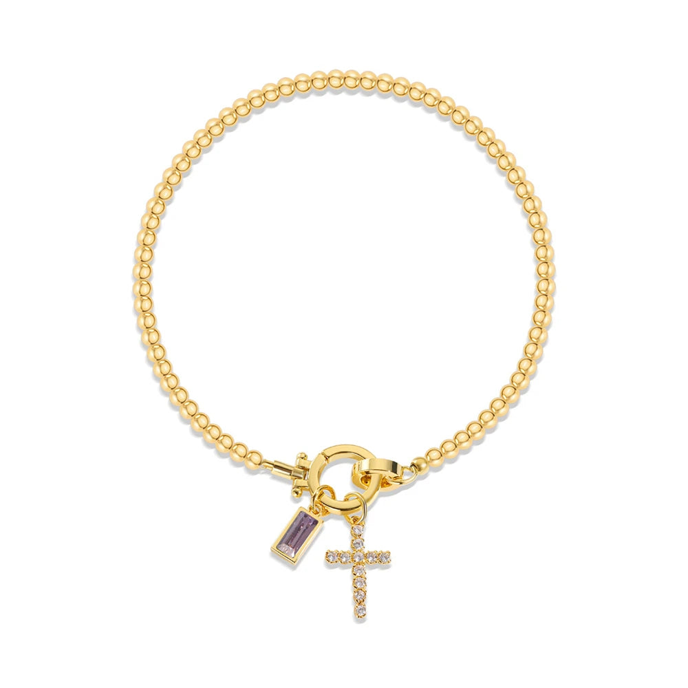 Bracelet avec croix et pierre de naissance