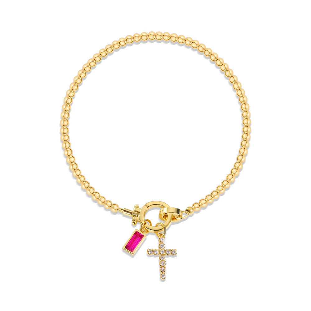 Bracelet avec croix et pierre de naissance
