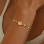 Bracelet with Virgin Mary medallion and gold Cross