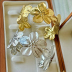 Bracelet with large hibiscus flowers, gold