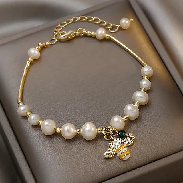 Bracelet with white beads bee