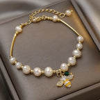 Bracelet with white beads bee