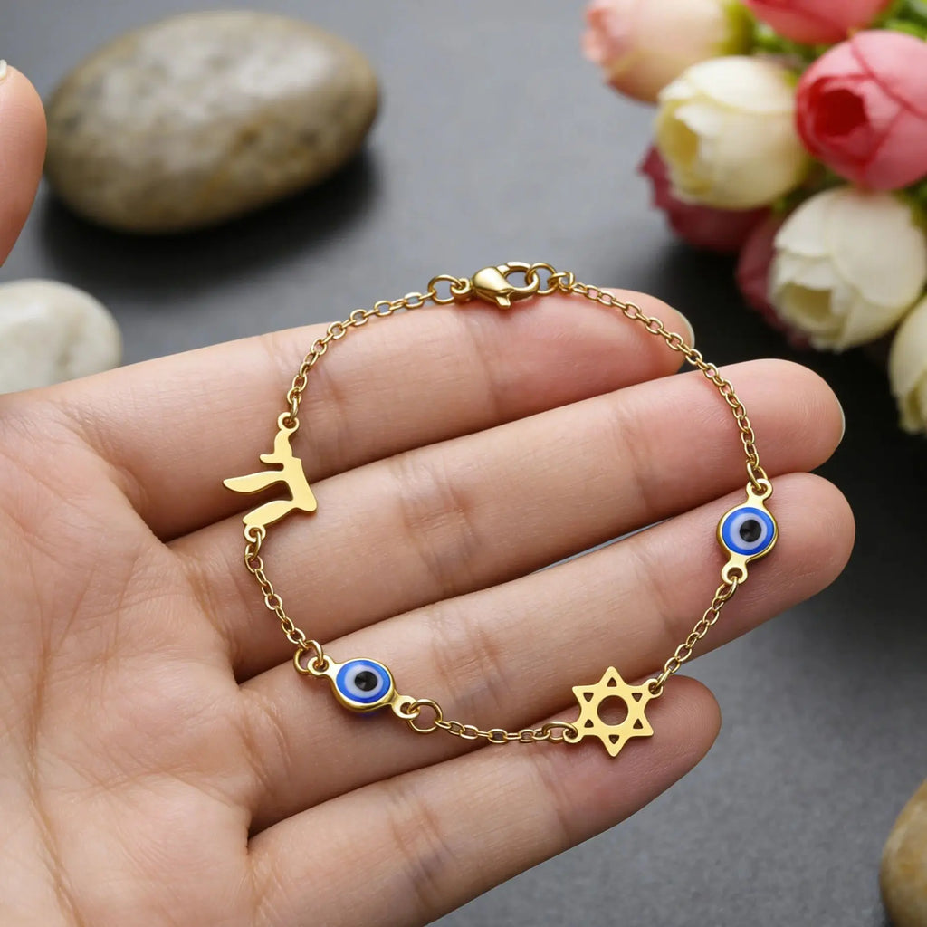 Bracelet with blue eye protection symbols, Chai and the gold Star of David