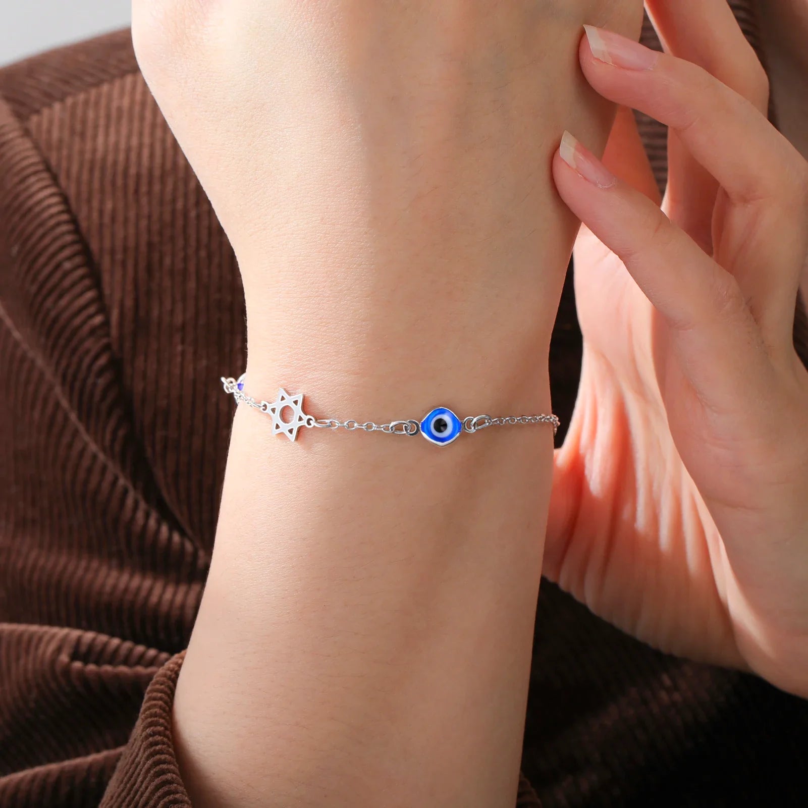 Bracelet with blue eye protection symbols, Chai and the silver Star of David