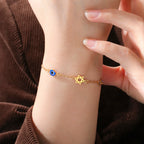 Bracelet with blue eye protection symbols, Chai and the gold Star of David