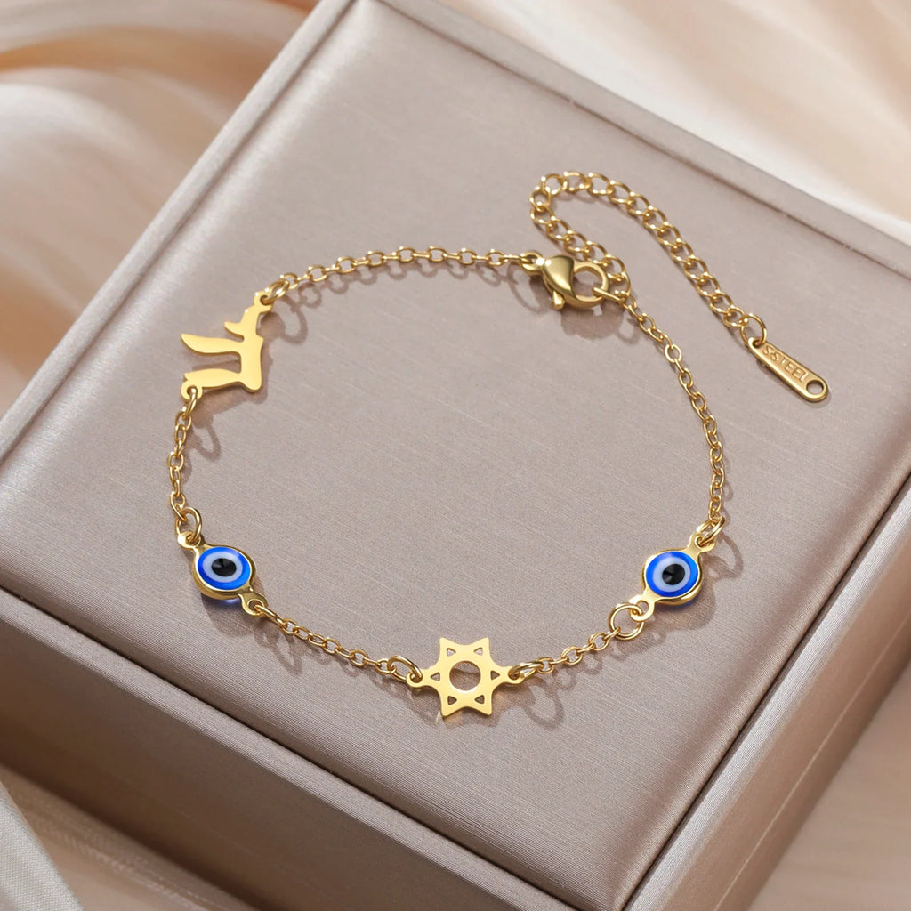 Bracelet with blue eye protection symbols, Chai and the gold Star of David