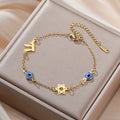 Bracelet with blue eye protection symbols, Chai and the gold Star of David