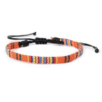 Bracciale brasiliano dell'amicizia intrecciato a mano arancione