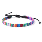 Bracciale brasiliano dell'amicizia intrecciato a mano viola