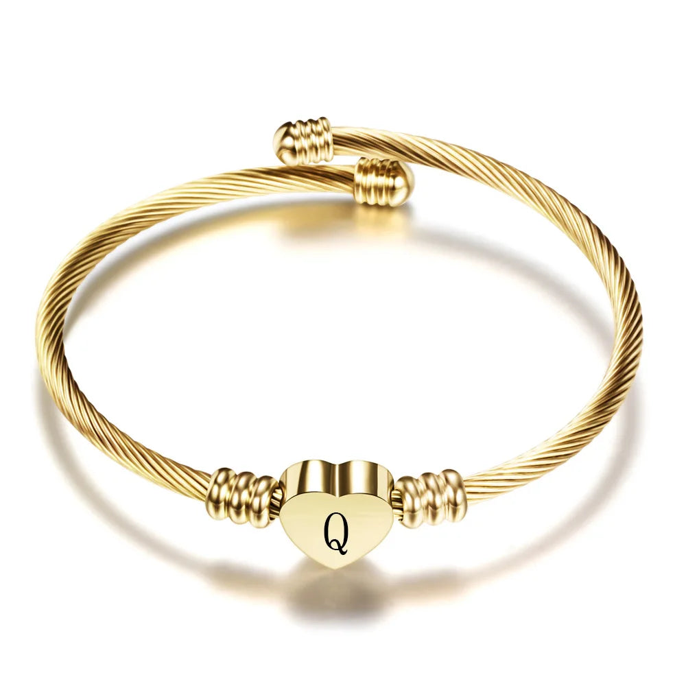 Bracelet coeur avec initiale or q